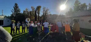 This image shows the band and the girls interacting with each other.